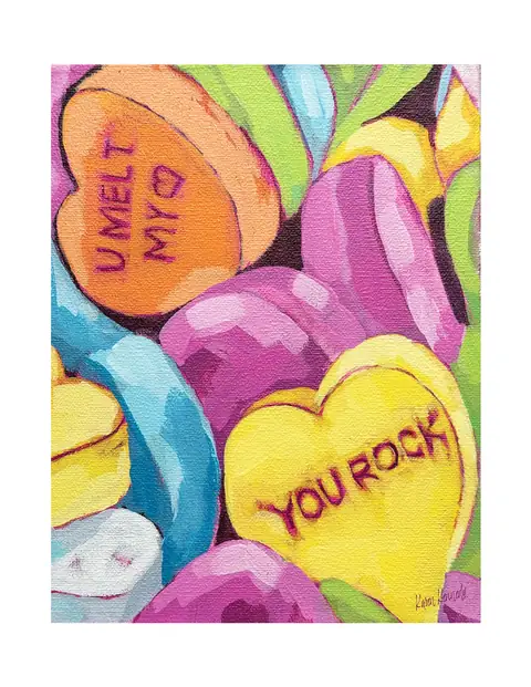 Colorful conversation heart candies with sweet messages.