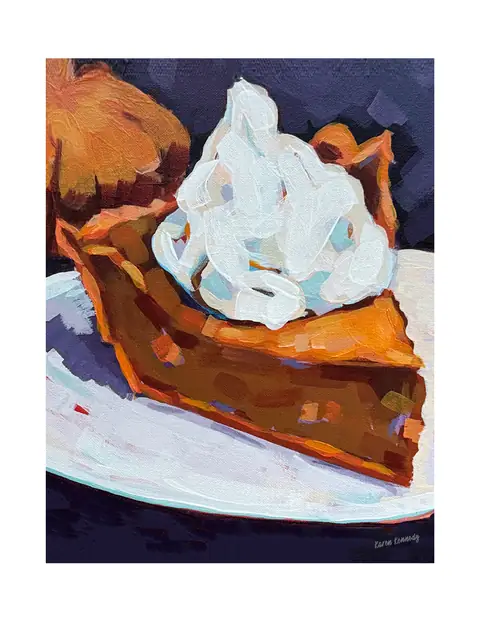 A slice of pumpkin pie topped with whipped cream on a plate.