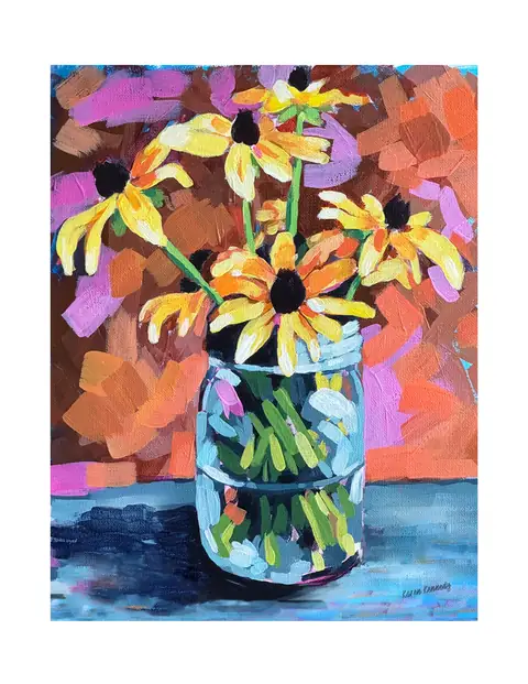 Yellow daisies in a blue glass jar against a warm background.